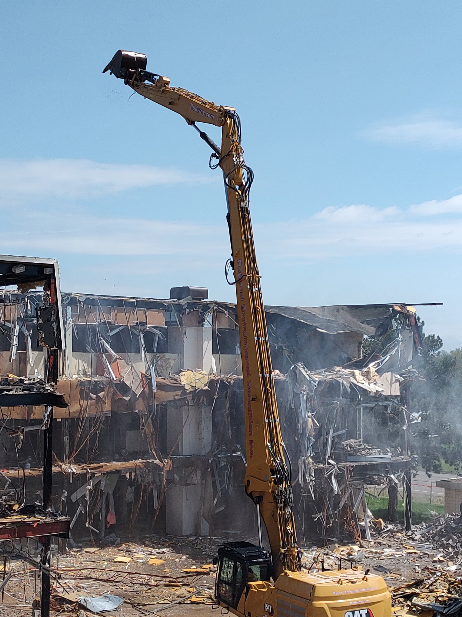 Excavators in action during controlled demolition of the Bell Aerospace building in Niagara Falls, NY.
